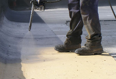 Coating systems over Atlanta spray foam roof systems